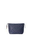 Quilted navy blue pouch on a white background