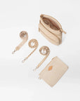 Interior of MZ Wallace Downtown Crosby Crossbody Buff Crossbody with three straps and pouch in front of white background