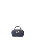 Navy quilted cosmetic bag with gold zipper on a white background