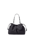 Black handbag with quilted design on a white background