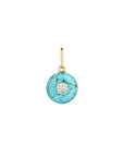 Turquoise pendant with gold chain on a white background