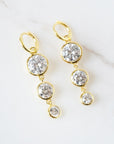 Mini Dropping Circles Huggie Hoop Earrings Cubic Zirconia Earrings Laura Foote Designs