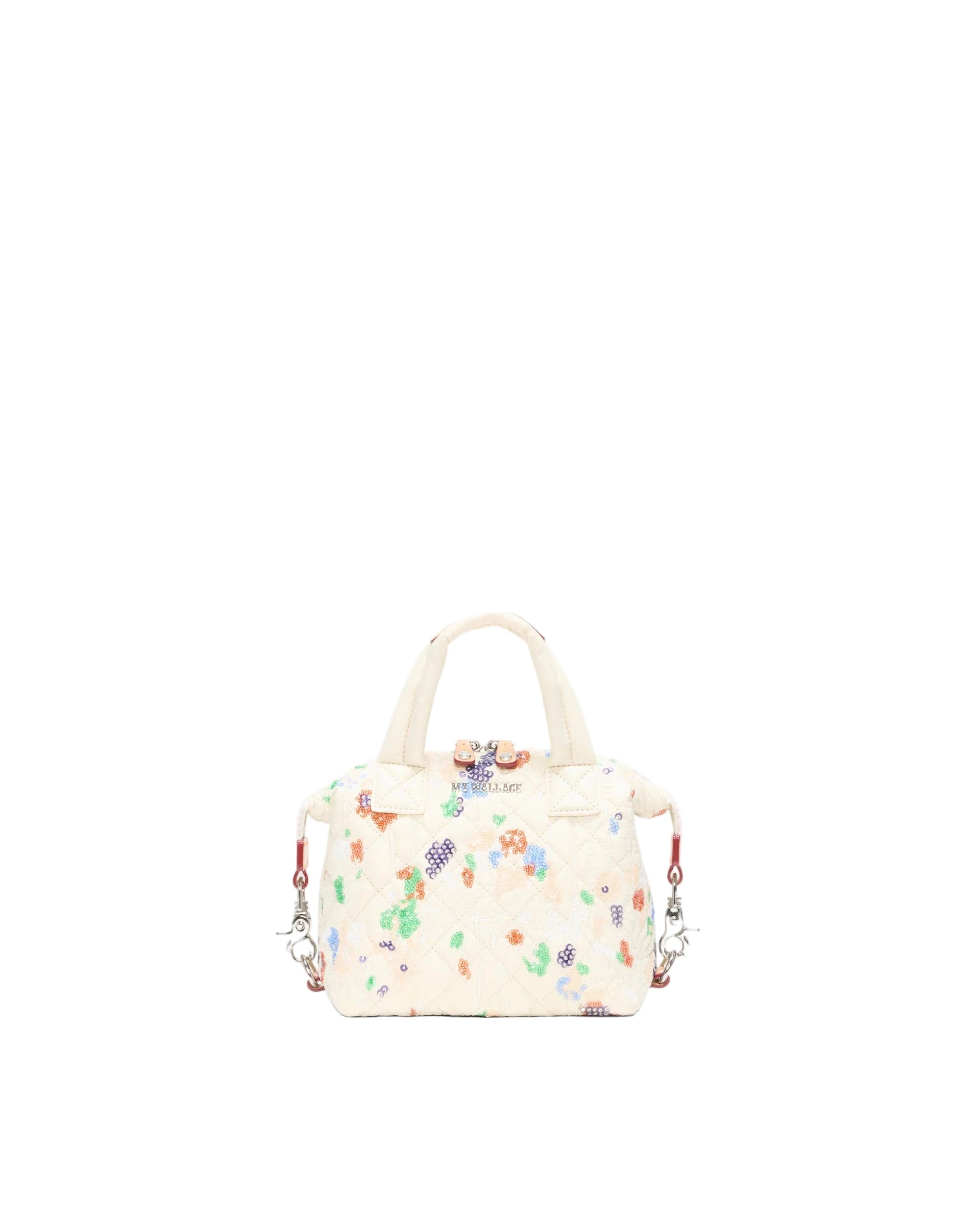 Small handbag with colorful floral pattern on a white background