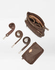 Ariel view of mz Wallace Downtown Crosby Crossbody Walnut on a white background with the strap and interior pouch laid out