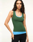 staud Hermosa Tank Jungle/Sky on a brunette model also wearing black leggings in front of a beige background