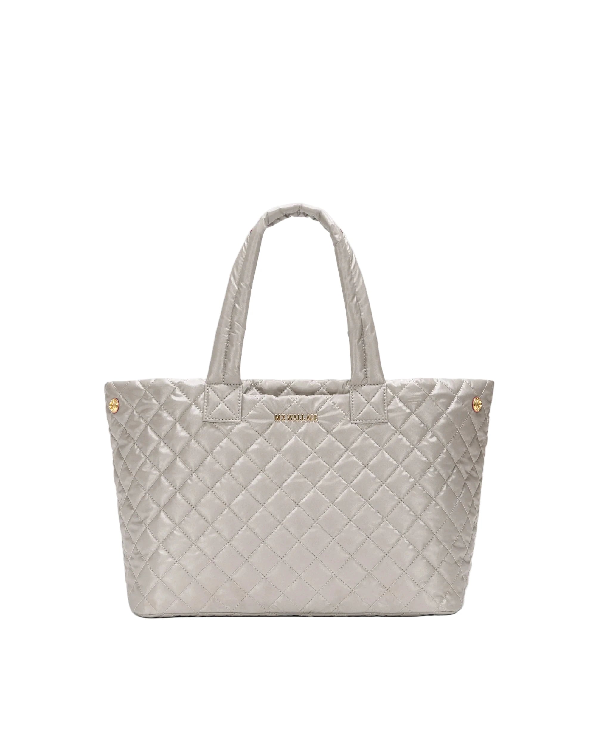 Quilted tote bag with a brand logo on a white background