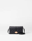 back view of the mz wallace Astor Convertible Crossbody Black on a grey background 