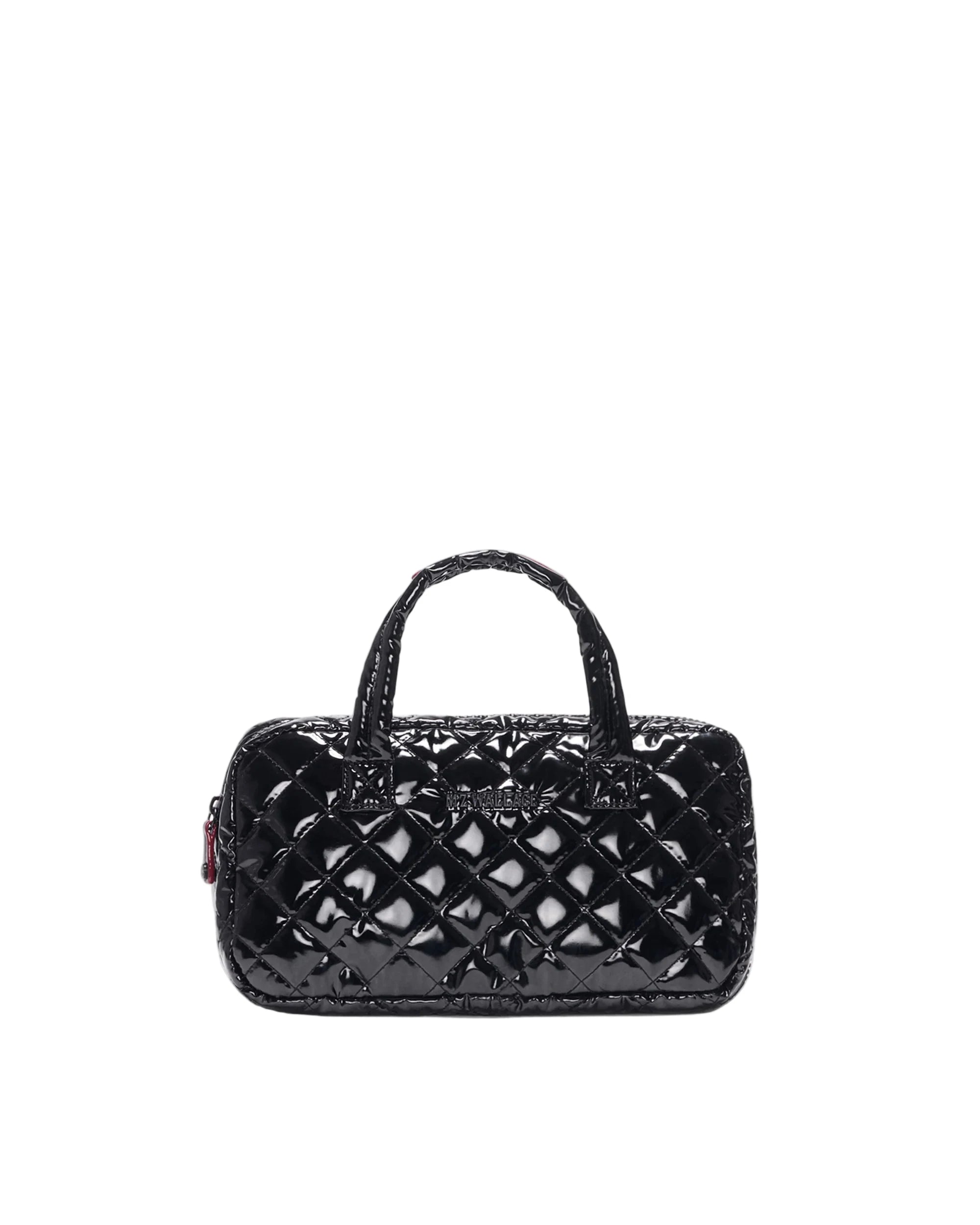 Black quilted handbag on a light gray background