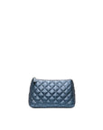 Blue quilted clutch bag on a white background