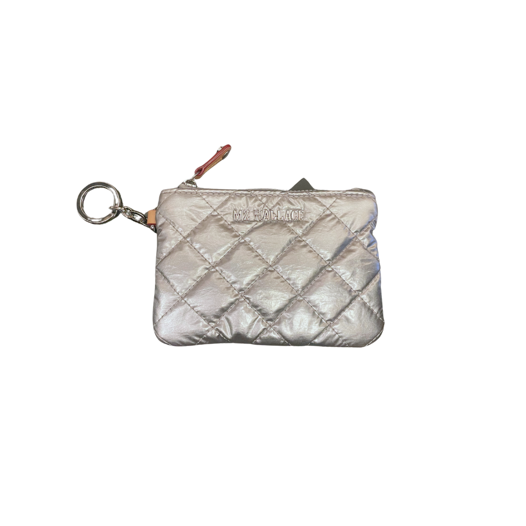 front of mz Wallace Flat Metro Key Pouch Silver Metallic on a white background