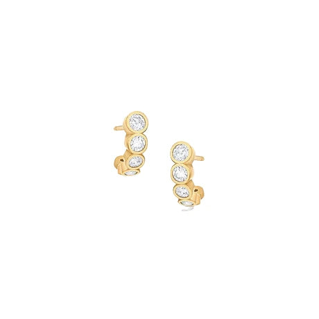 Gold earrings with clear gemstones on a white background