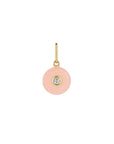 Pink pendant with a gold chain and small gemstone on a white background