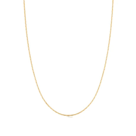 Gold chain necklace on a white background