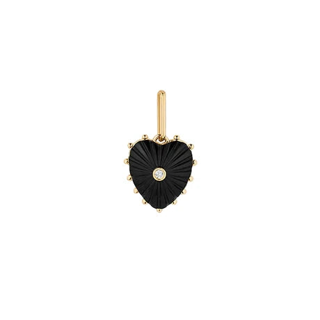 Heart-shaped pendant with black stone and gold accents on a white background