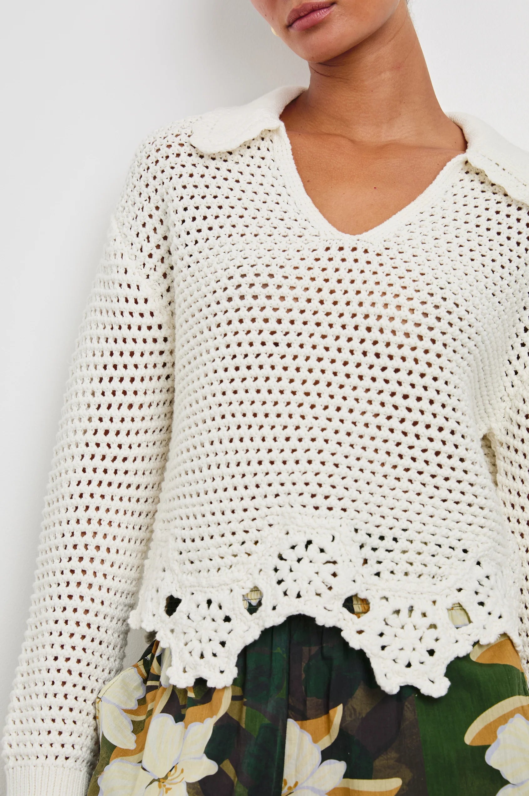 front view of the torso of brunette model wearing the rails louise sweater in ivory