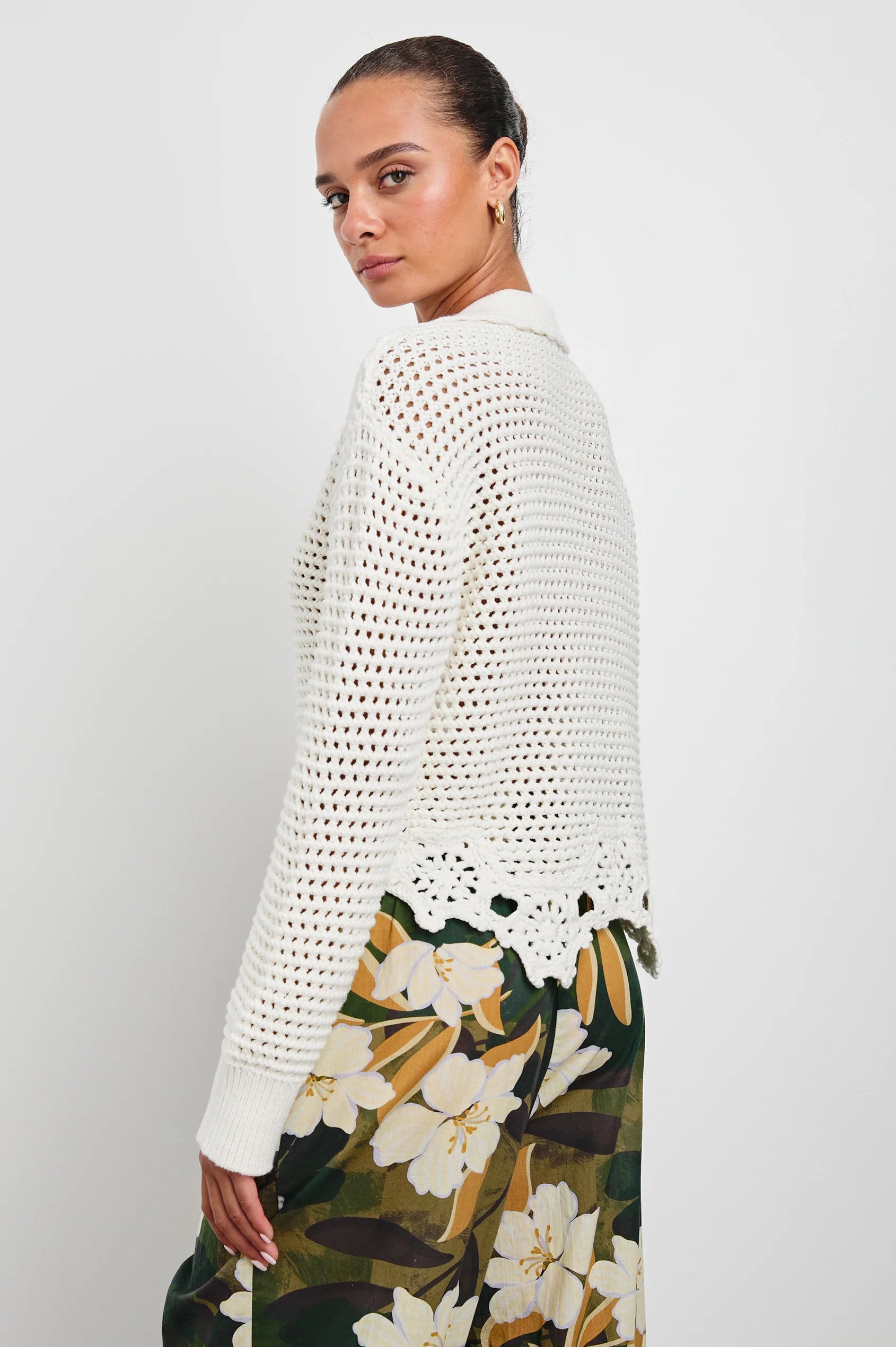 back view of the upper half brunette model wearing the rails louise sweater in ivory