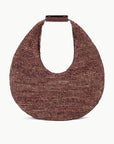 front view of Staud Large Raffia Moon Tote Bag in Mahogany with white background