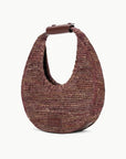 side view of staud moon raffia tote bag in mahogany with white background