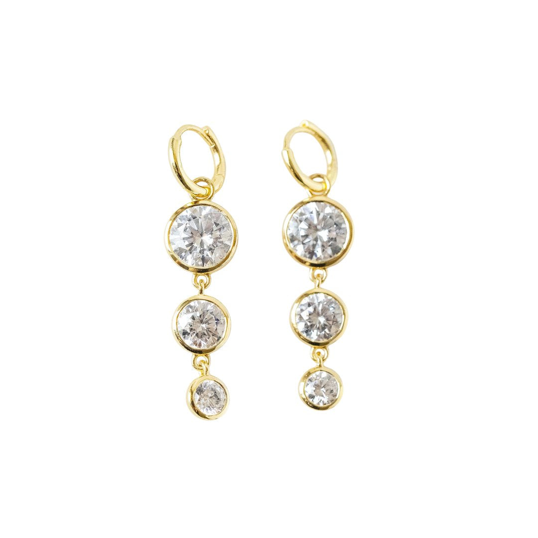 Mini Dropping Circles Huggie Hoop Earrings Cubic Zirconia Earrings Laura Foote Designs 