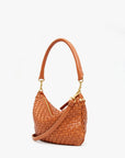 side view of the r Clare v Petit Moyen Messenger Natural Woven Checker on a white background