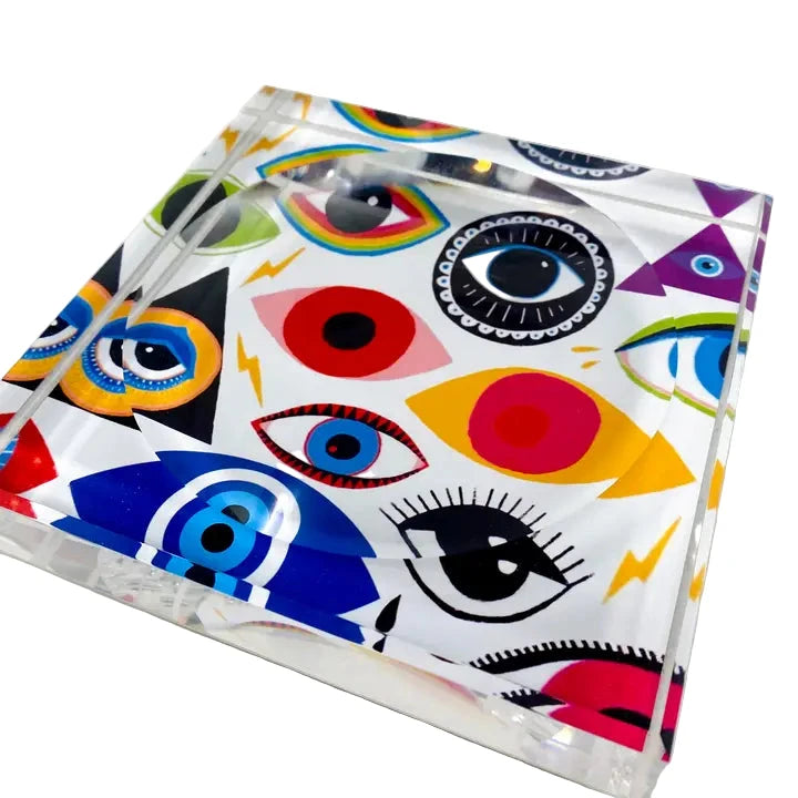 Colorful abstract design on a clear plastic sheet with white background