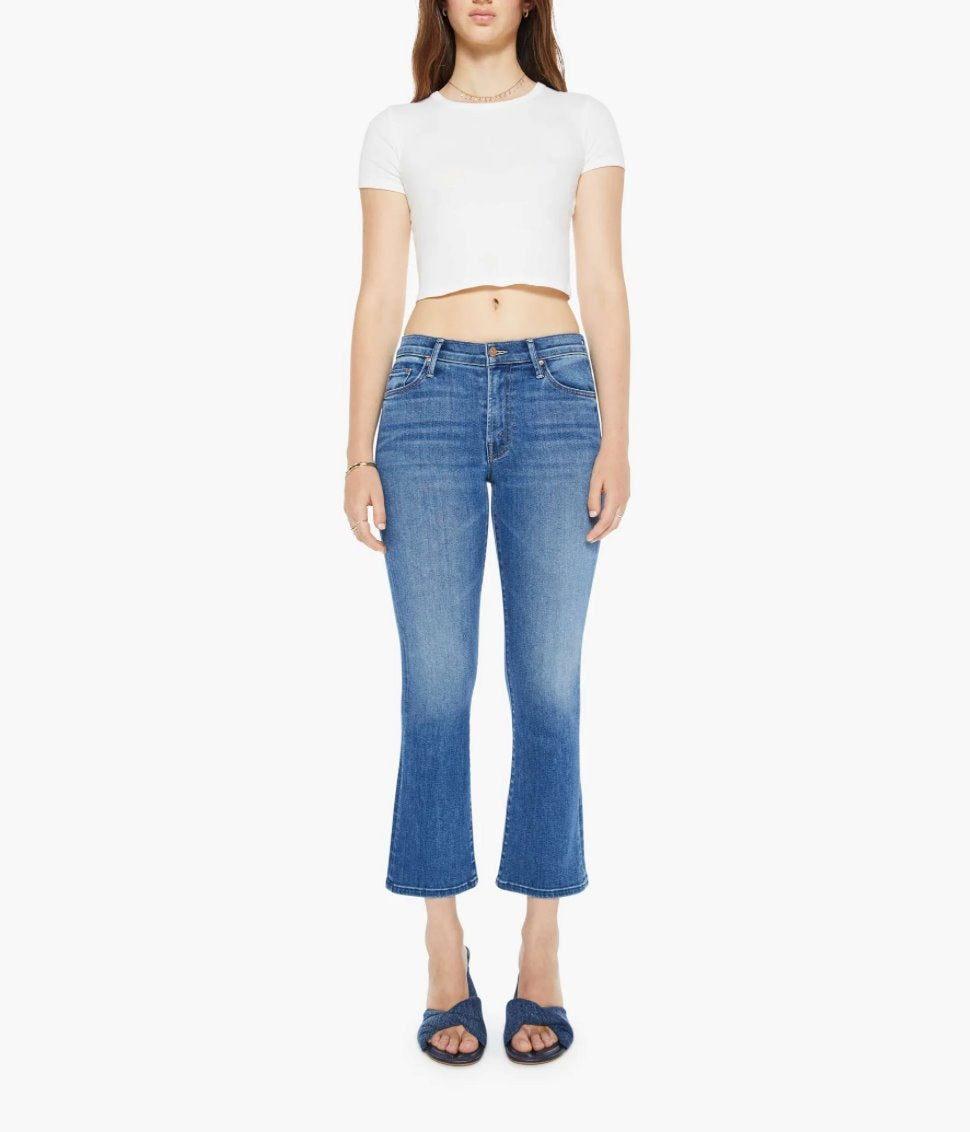 full front view of model wearing mother The Outsider Ankle Connect The Dots, a white tee, and denim sandals on a white background