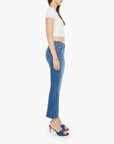 full side view of model wearing mother The Outsider Ankle Connect The Dots, a white tee, and denim sandals on a white background