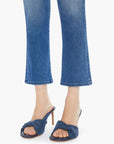 Front below the knee view of model wearing mother The Outsider Ankle Connect The Dots, a white tee, and denim sandals on a white background