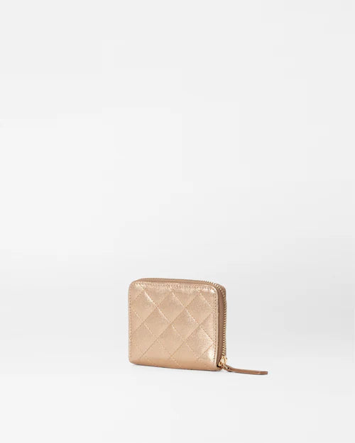 back view of the mz Wallace honey metallic leather small zip round wallet on a white background